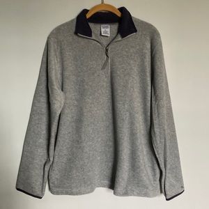 Grey & Blue soft plush shirt. Pockets on each side, zipper in front, pull on.
